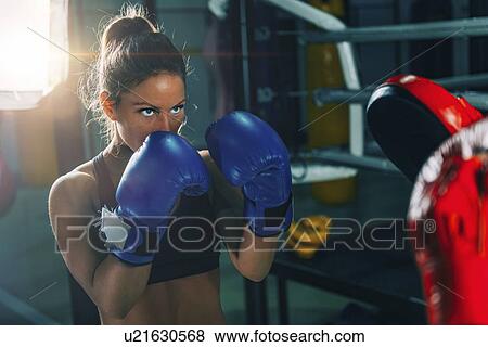 Stock Photo - Boxing training. Fotosearch