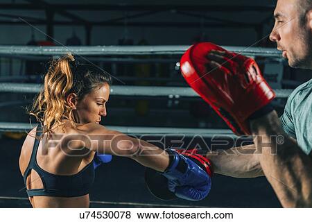Stock Photo - Boxing training. Fotosearch