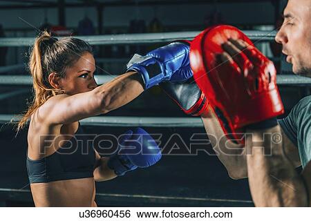 Stock Photograph - Boxing training. Fotosearch
