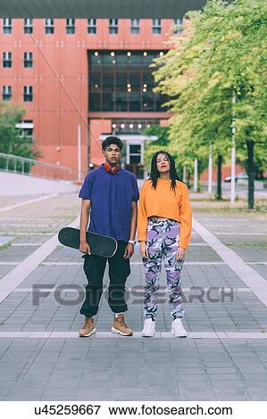Brother and sister posing side by side, Milan, Italy View Large Photo Image Stock Photo - Brother and sister posing side by side, Milan, Italy. Fotosearch