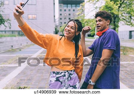 Brother and sister taking selfie View Large Photo Image Stock Photo - Brother and sister taking selfie. Fotosearch