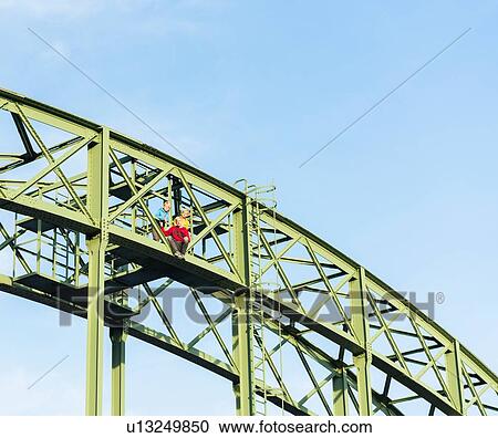 Stock Image - Brothers on Porta Westfalica, Nordrhein-Westfalen, Germany. Fotosearch