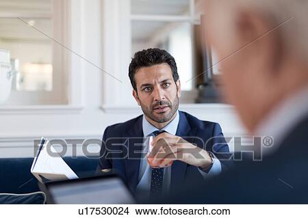 Businessmen talking in restaurant View Large Photo Image Picture - Businessmen talking in restaurant. Fotosearch