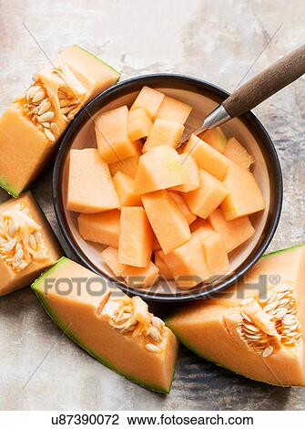 Cantaloupe melon pieces View Large Photo Image Stock Image - Cantaloupe melon pieces. Fotosearch