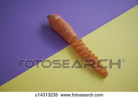 Stock Photography - Carrot against duotone background. Fotosearch
