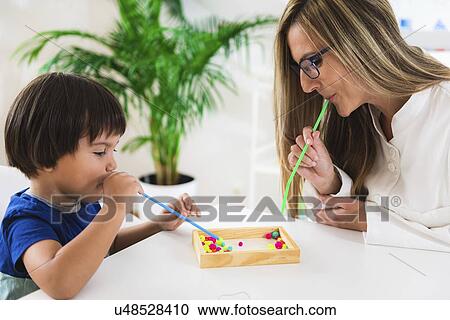 Stock Image - Child psychology session. Fotosearch