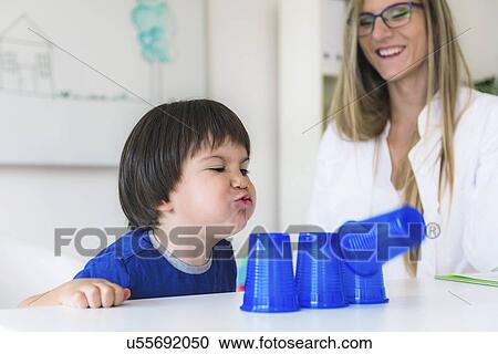 Stock Image - Child psychology session. Fotosearch