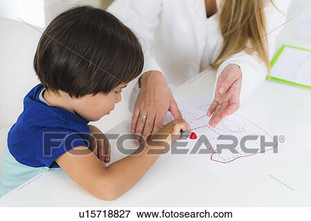 Stock Photo - Child psychology session. Fotosearch