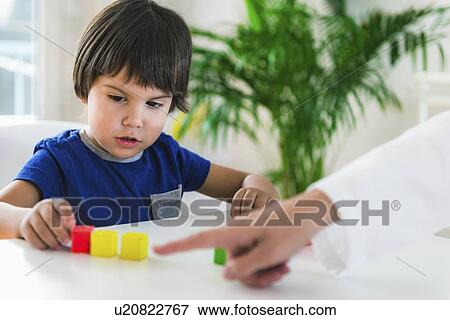 Stock Photo - Child psychology session. Fotosearch
