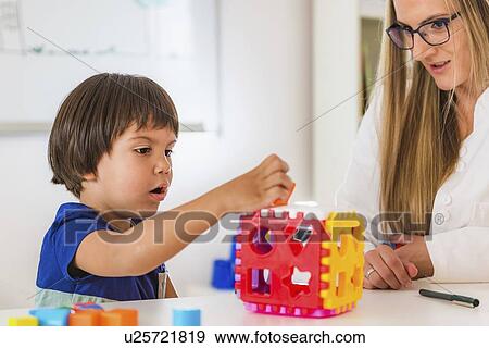 Stock Photo - Child psychology session. Fotosearch