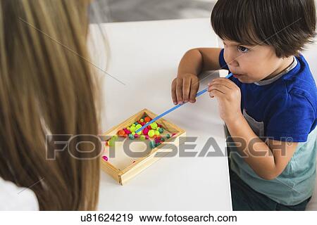 Stock Photo - Child psychology session. Fotosearch