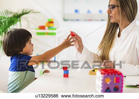 Child psychology session View Large Photo Image Stock Photograph - Child psychology session. Fotosearch