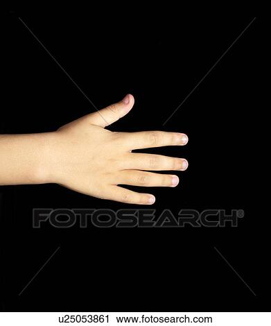 Child's hand against black background View Large Photo Image Stock Image - Child's hand against black background. Fotosearch