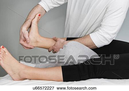 Stock Photo - Chiropractic adjustment. Fotosearch