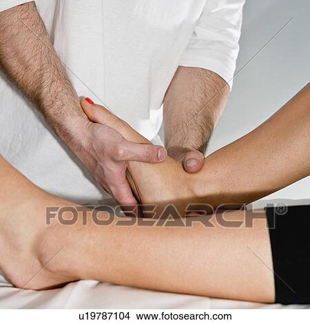 Picture - Chiropractic treatment. Fotosearch