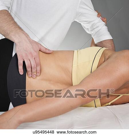 Chiropractic treatment View Large Photo Image Stock Photo - Chiropractic treatment. Fotosearch