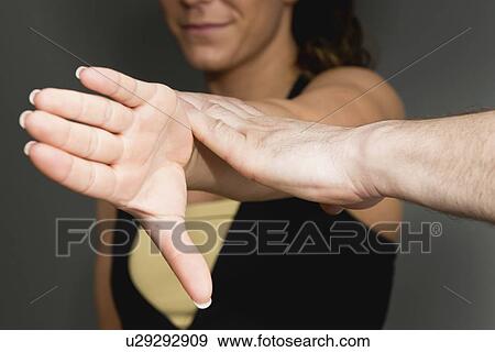 Chiropractor examining patient View Large Photo Image Stock Photo - Chiropractor examining patient. Fotosearch