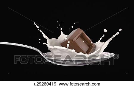 Stock Photo - Chocolate cube splash in milk on metallic spoon. Isolated on black background. Close up view.. Fotosearch
