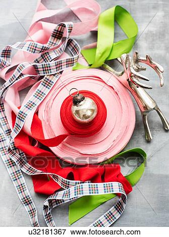 Stock Photo - Christmas baubles, ornaments and ribbons. Fotosearch