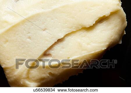 Cinnamon roll cream top, close up, overhead view View Large Photo Image Picture - Cinnamon roll cream top, close up, overhead view. Fotosearch