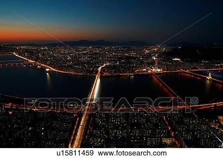 Stock Photo - Cityscape at dusk, Seoul, South Korea. Fotosearch