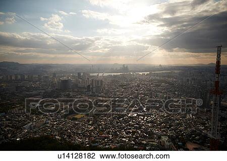 Cityscape at sunrise, Seoul, South Korea View Large Photo Image Stock Image - Cityscape at sunrise, Seoul, South Korea. Fotosearch