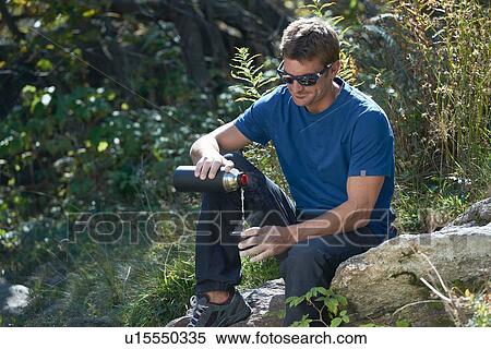 Climber having drink, Chamonix, Rhone-Alps, France View Large Photo Image Stock Photography - Climber having drink, Chamonix, Rhone-Alps, France. Fotosearch