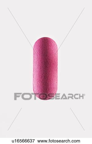 Stock Photo - Close-up of one pink pill, a painkiller.. Fotosearch