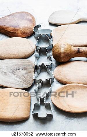 Close up of wooden spoons with Christmas cookie cutters View Large Photo Image Stock Image - Close up of wooden spoons with Christmas cookie cutters. Fotosearch
