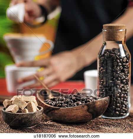Coffee beans and sugar cubes View Large Photo Image Stock Photograph - Coffee beans and sugar cubes. Fotosearch