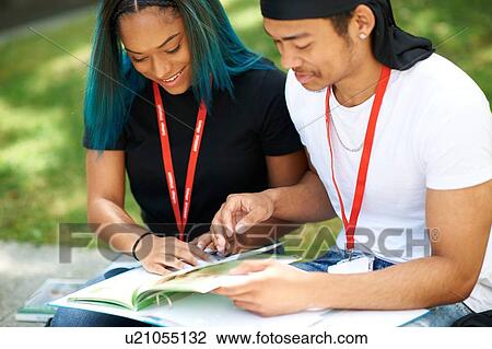 College students reading and talking in campus View Large Photo Image Stock Image - College students reading and talking in campus. Fotosearch