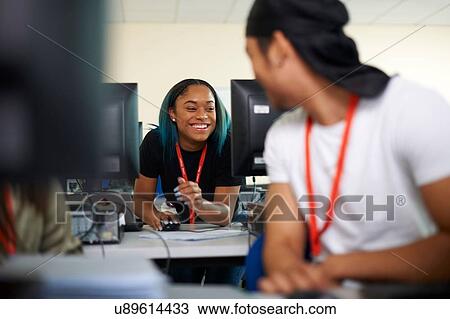 College students studying with computer in classroom View Large Photo Image Stock Image - College students studying with computer in classroom. Fotosearch