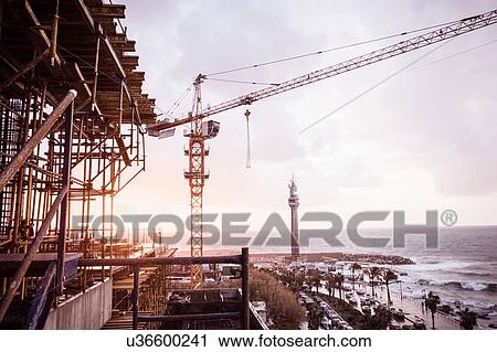 Stock Image - Construction crane on coastal development, Beirut, Lebanon. Fotosearch