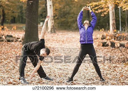 Stock Photograph - Couple exercising outdoors. Fotosearch