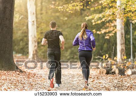 Stock Image - Couple jogging. Fotosearch