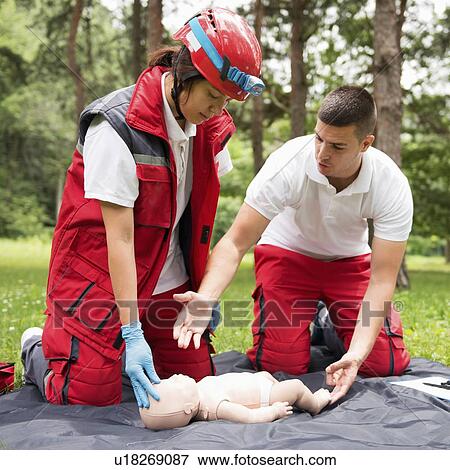 CPR training on baby dummy View Large Photo Image Stock Photo - CPR training on baby dummy. Fotosearch