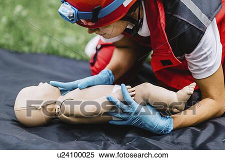 CPR training on baby dummy View Large Photo Image Stock Photography - CPR training on baby dummy. Fotosearch