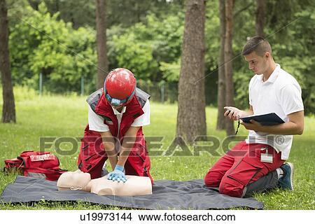 CPR training on dummy View Large Photo Image Picture - CPR training on dummy. Fotosearch