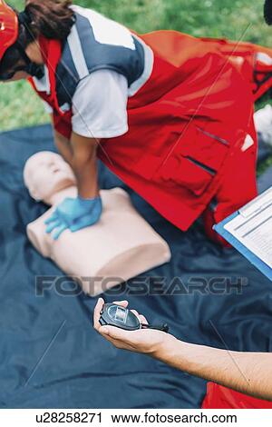 CPR training on dummy View Large Photo Image Stock Image - CPR training on dummy. Fotosearch