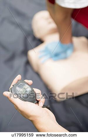 CPR training on dummy View Large Photo Image Stock Photo - CPR training on dummy. Fotosearch
