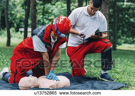 CPR training on dummy View Large Photo Image Stock Photography - CPR training on dummy. Fotosearch