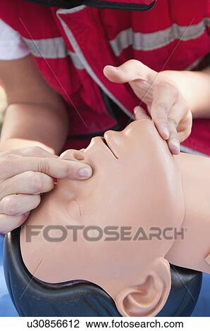 Stock Image - CPR training. Fotosearch