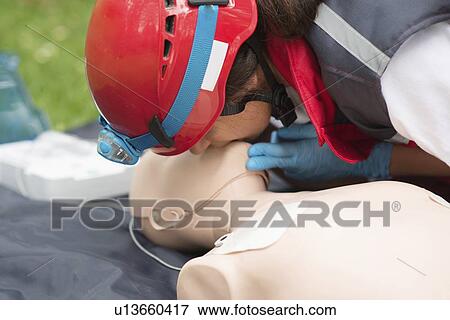 Stock Photo - CPR training. Fotosearch