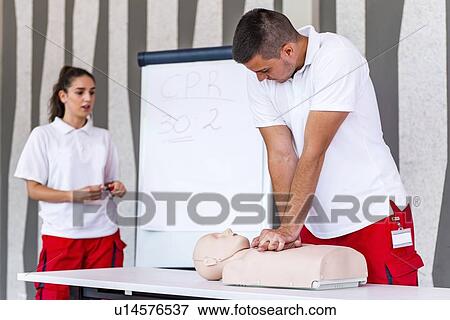 Stock Photo - CPR training. Fotosearch