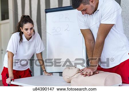 Stock Photo - CPR training. Fotosearch