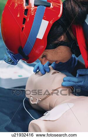 Stock Photograph - CPR training. Fotosearch