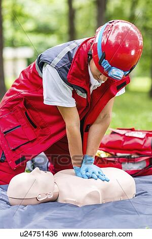 Stock Photograph - CPR training. Fotosearch