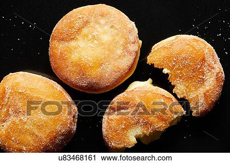 Cream filled doughnuts, overhead view View Large Photo Image Stock Image - Cream filled doughnuts, overhead view. Fotosearch