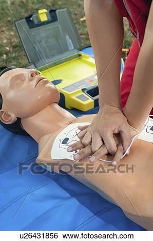 Defibrillator training View Large Photo Image Stock Photograph - Defibrillator training. Fotosearch