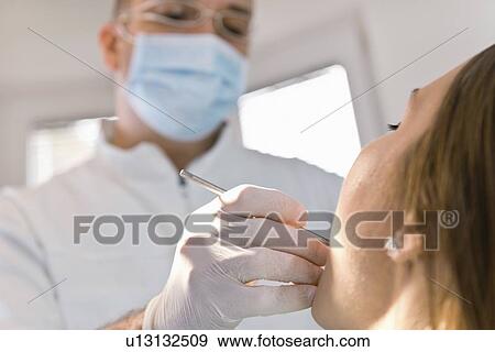 Stock Photo - Dental check-up. Fotosearch